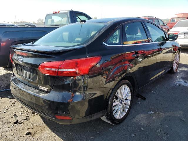 Photo 4 from auction – 2015 FORD FOCUS TITA with VIN 1FADP3J26FL385107