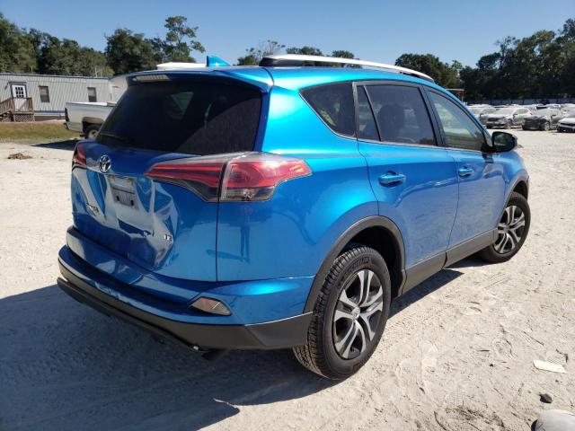 Photo 4 from auction – 2016 TOYOTA RAV4 LE with VIN JTMZFREV3GJ094250