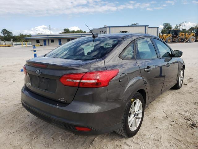 Photo 4 from auction – 2015 FORD FOCUS SE with VIN 1FADP3F27FL235497