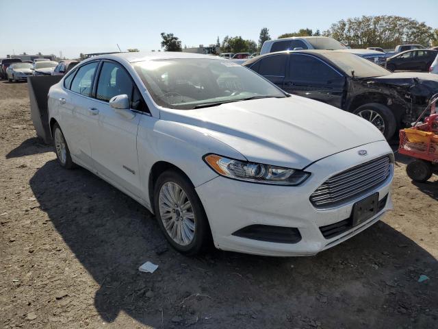 FORD FUSION HYB 2016 with VIN 3FA6P0LU5GR404979 - Photo from auction