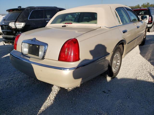 Photo 4 from auction – 2002 LINCOLN TOWN CAR C with VIN 1LNHM83W32Y658773