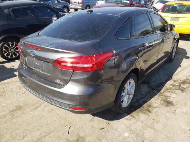 Photo 4 from auction – 2016 FORD FOCUS SE with VIN 1FADP3F25GL281878