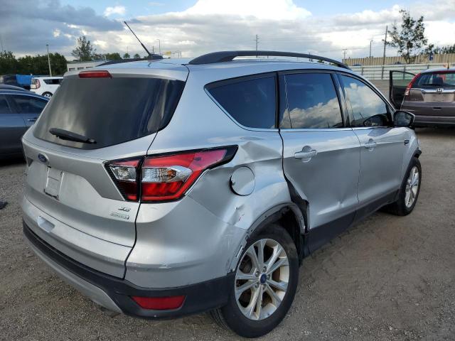 Photo 4 from auction – 2018 FORD ESCAPE SE with VIN 1FMCU0GD0JUD41334