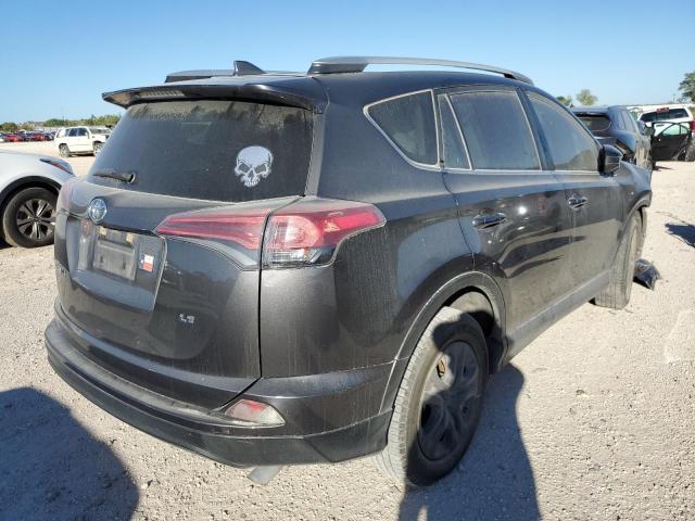 Photo 4 from auction – 2016 TOYOTA RAV4 LE with VIN JTMZFREV7GJ088886