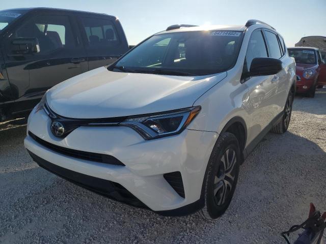 Photo 2 from auction – 2018 TOYOTA RAV4 LE with VIN JTMZFREV1JJ744572