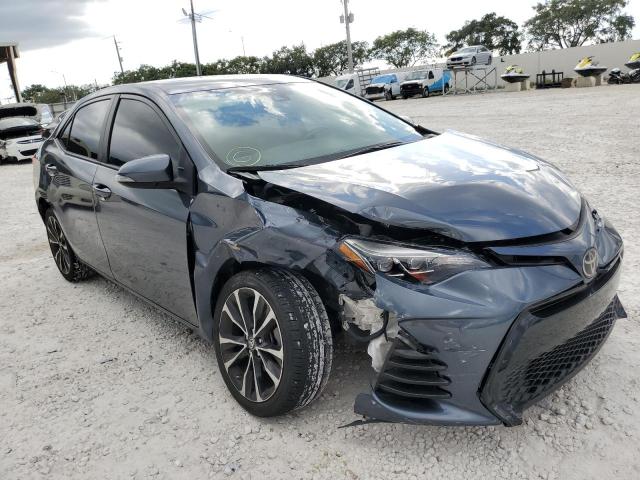 TOYOTA COROLLA L 2018 with VIN 5YFBURHE4JP813169 - Photo from auction
