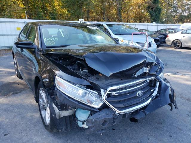 FORD TAURUS SEL 2013 with VIN 1FAHP2E84DG219880 - Photo from auction
