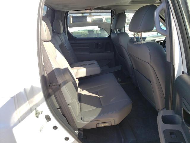 Photo 6 from auction – 2014 HONDA RIDGELINE with VIN 5FPYK1F55EB002056
