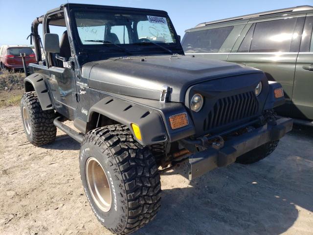 JEEP WRANGLER / 2000 with VIN 1J4FA49S2YP789185 - Photo from auction