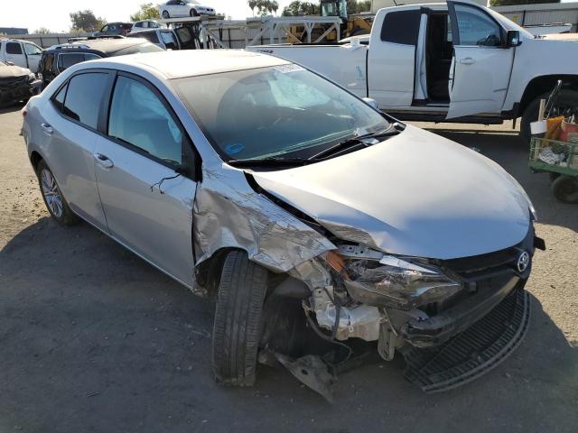 TOYOTA COROLLA L 2014 with VIN 5YFBURHE2EP017655 - Photo from auction