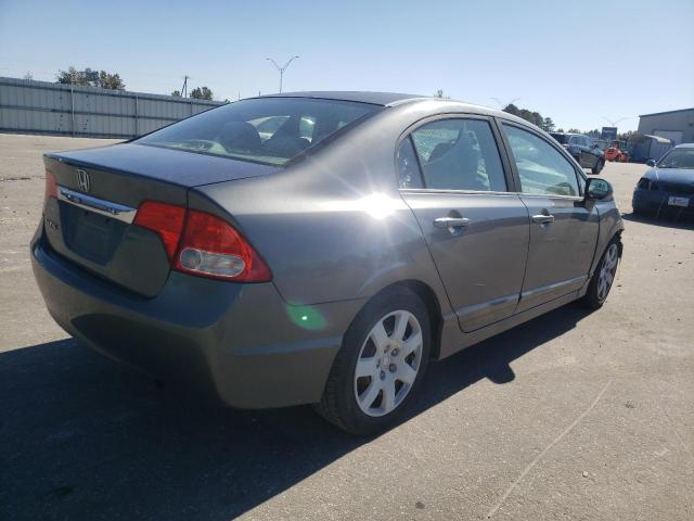 Photo 4 from auction – 2011 HONDA CIVIC LX with VIN 19XFA1F57BE021356