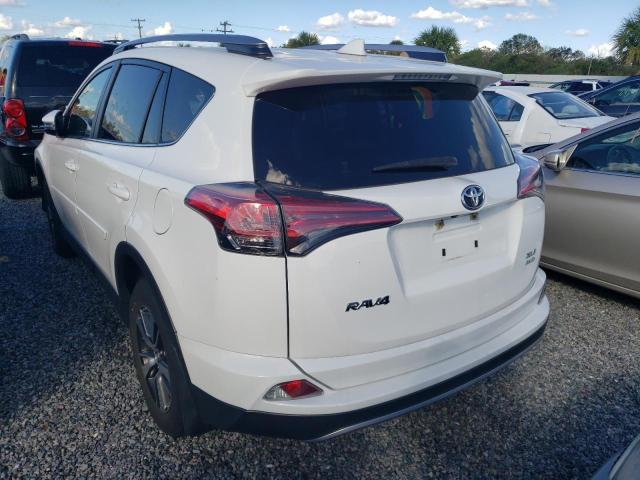 Photo 3 from auction – 2017 TOYOTA RAV4 XLE with VIN JTMRFREV9HJ710972