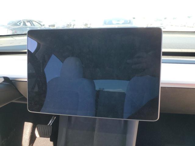 Photo 8 from auction – 2022 TESLA MODEL Y with VIN 7SAYGDEE2NF317123