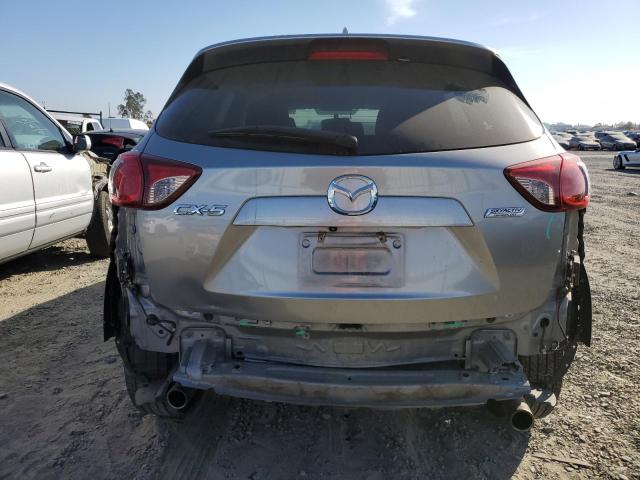 Photo 9 from auction – 2014 MAZDA CX-5 TOURI with VIN JM3KE2CY6E0365403