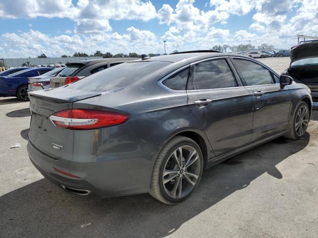 Photo 4 from auction – 2019 FORD FUSION TIT with VIN 3FA6P0D98KR119860