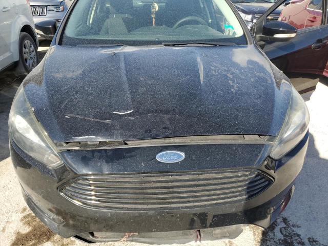 Photo 7 from auction – 2017 FORD FOCUS SE with VIN 1FADP3FE9HL275044