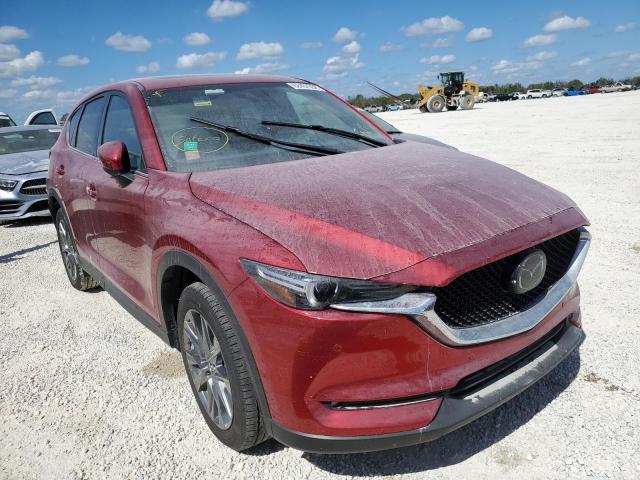 MAZDA CX-5 SIGNA 2021 with VIN JM3KFBEY1M0355208 - Photo from auction