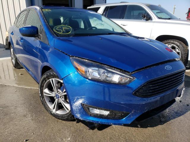FORD FOCUS SE 2018 with VIN 1FADP3FE6JL282166 - Photo from auction