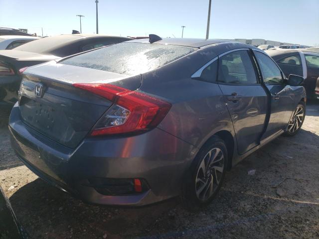 Photo 4 from auction – 2018 HONDA CIVIC EX with VIN 19XFC2F71JE029338