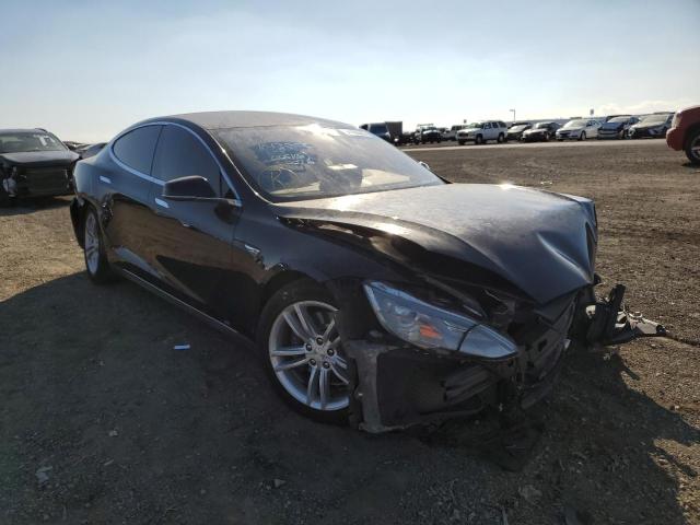 TESLA MODEL S 2014 with VIN 5YJSA1H15EFP50026 - Photo from auction