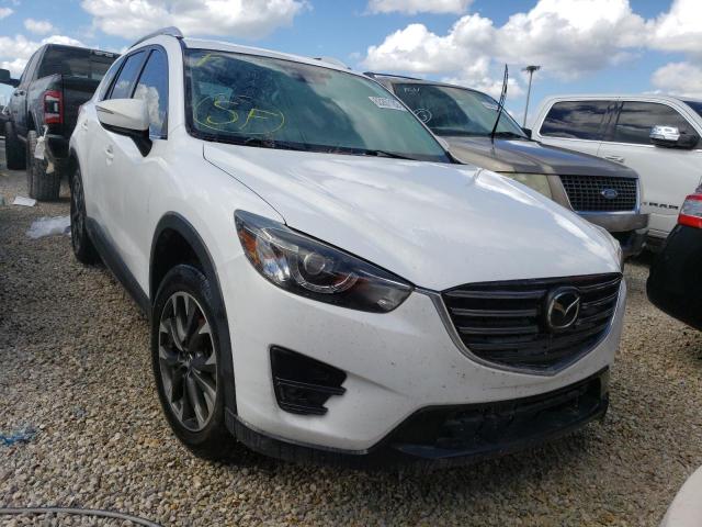 MAZDA CX-5 GT 2016 with VIN JM3KE2DY2G0734064 - Photo from auction