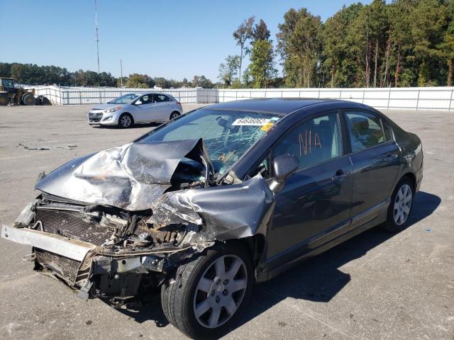 Photo 2 from auction – 2011 HONDA CIVIC LX with VIN 19XFA1F57BE021356