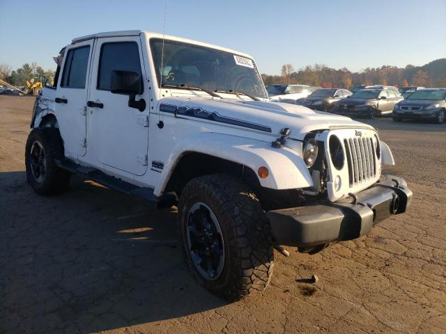JEEP WRANGLER U 2014 with VIN 1C4BJWEG0EL241321 - Photo from auction