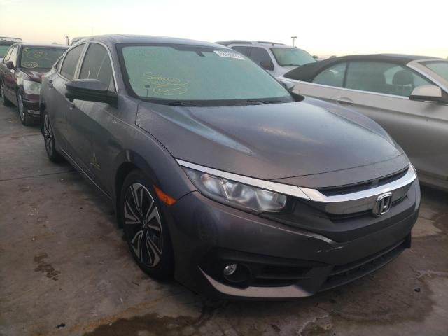 Photo 1 from auction – 2018 HONDA CIVIC EX with VIN JHMFC1F39JX039878
