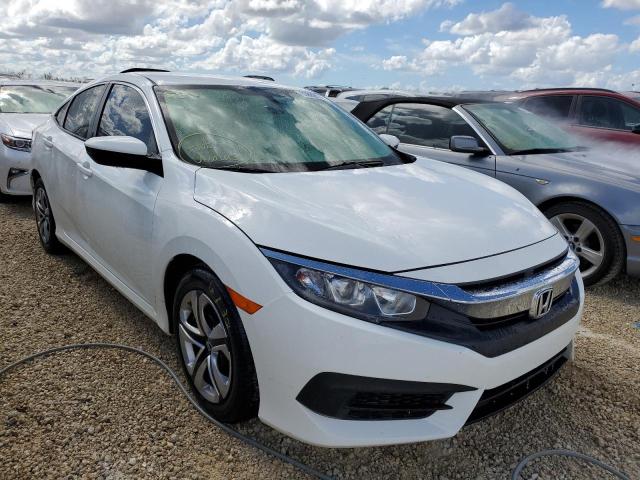 HONDA CIVIC LX 2018 with VIN 2HGFC2F57JH601713 - Photo from auction