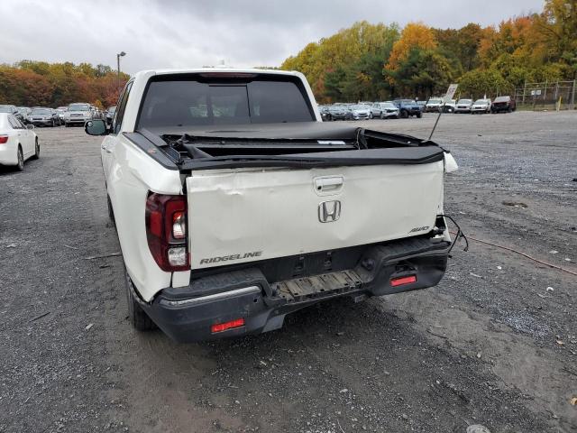 Photo 9 from auction – 2018 HONDA RIDGELINE with VIN 5FPYK3F77JB005855