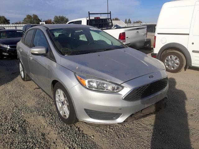 FORD FOCUS SE 2017 with VIN 1FADP3F28HL308895 - Photo from auction