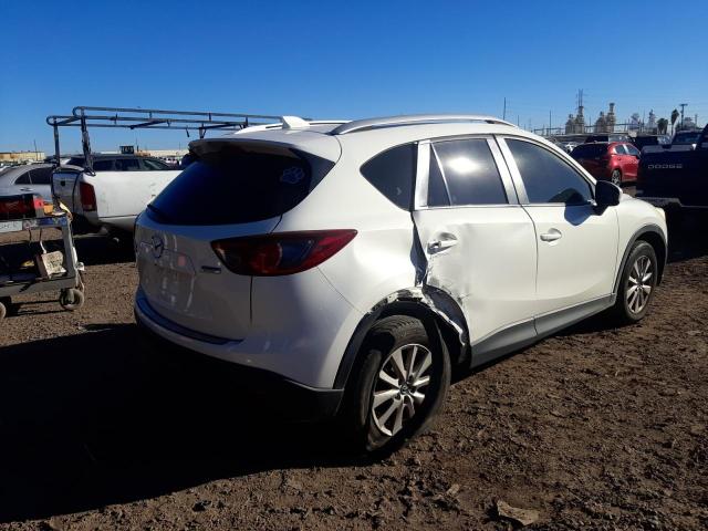 Photo 4 from auction – 2014 MAZDA CX-5 TOURI with VIN JM3KE4CY6E0321185