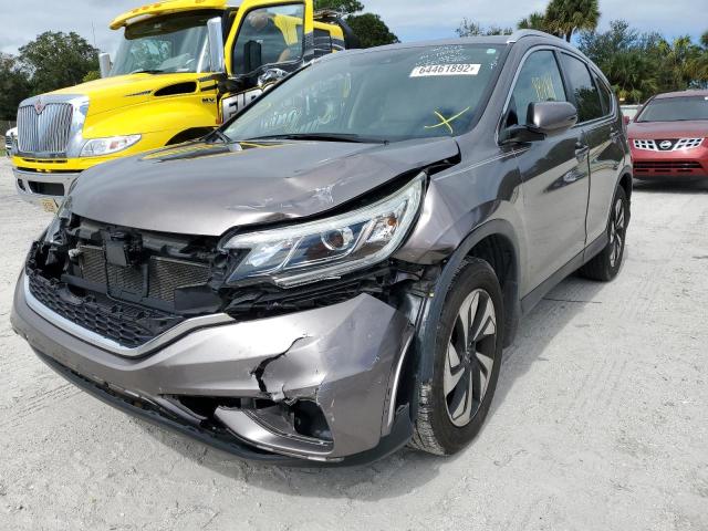 Photo 9 from auction – 2015 HONDA CR-V TOURI with VIN 5J6RM3H93FL004643