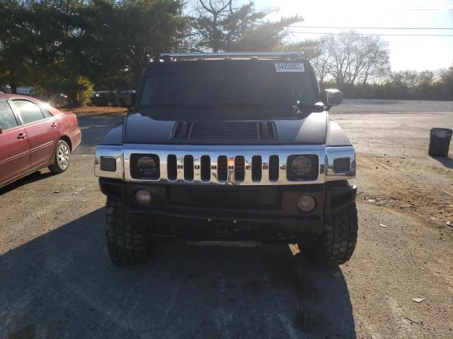 Фото 9 с аукциона – 2003 HUMMER H2 с VIN 5GRGN23U93H108356