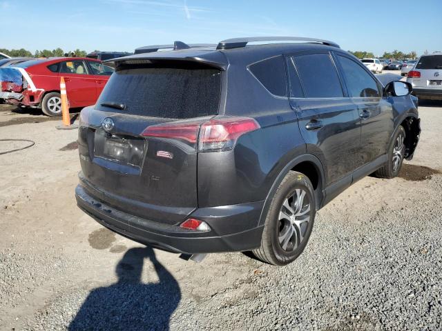 Photo 4 from auction – 2017 TOYOTA RAV4 LE with VIN JTMZFREV2HJ105479