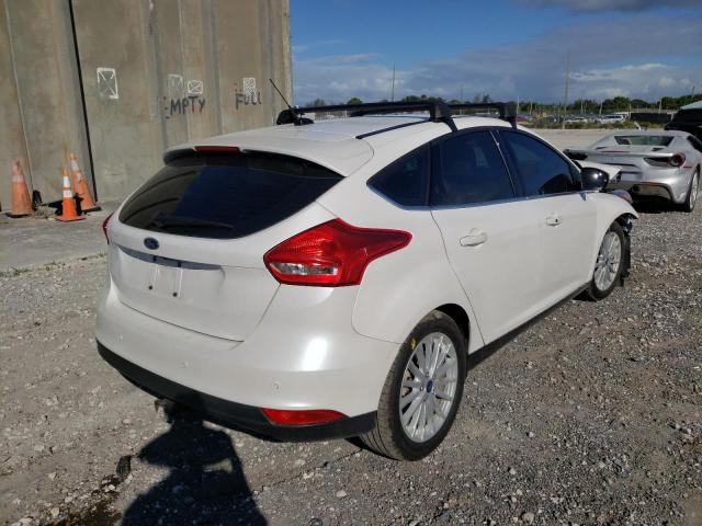 Photo 4 from auction – 2017 FORD FOCUS BEV with VIN 1FADP3R41HL349012
