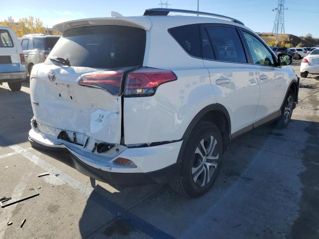 Photo 4 from auction – 2018 TOYOTA RAV4 LE with VIN JTMBFREV1JJ201756
