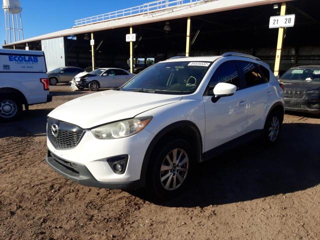 Photo 2 from auction – 2014 MAZDA CX-5 TOURI with VIN JM3KE4CY6E0321185