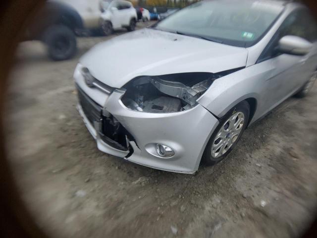Foto 9 de la subasta – 2012 FORD FOCUS SE con VIN 1FAHP3K22CL209408