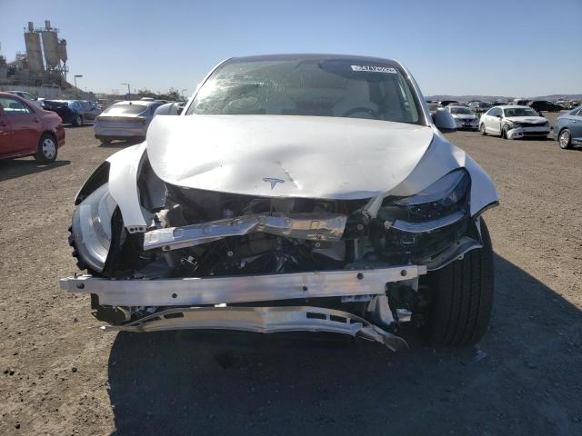 Photo 9 from auction – 2021 TESLA MODEL Y with VIN 5YJYGDEE0MF268693