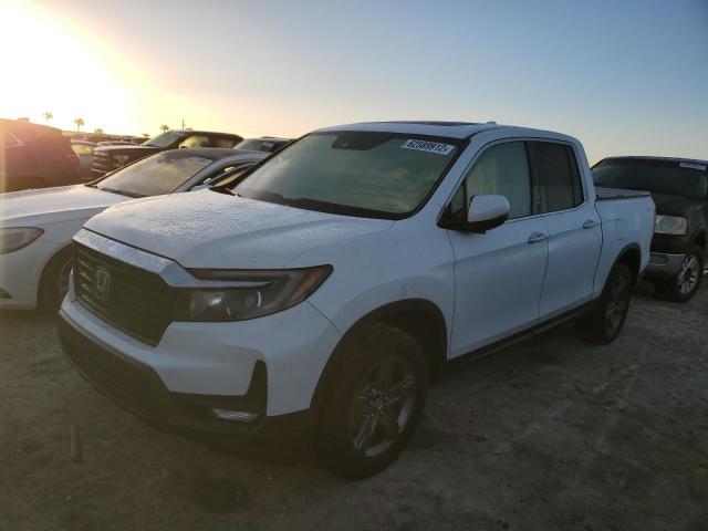 Photo 2 from auction – 2021 HONDA RIDGELINE with VIN 5FPYK3F75MB019709