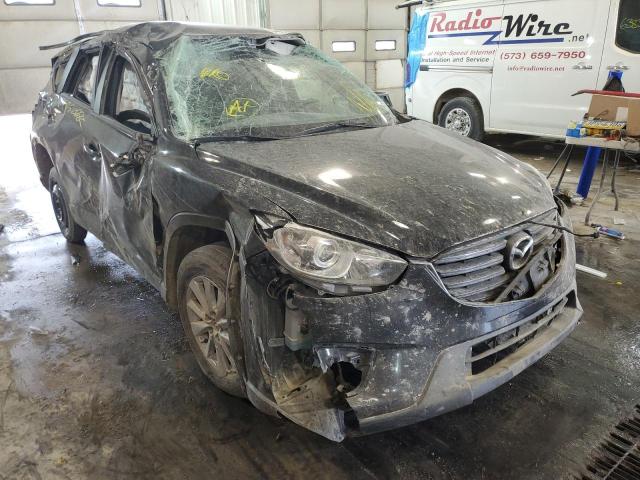 MAZDA CX-5 TOURI 2016 with VIN JM3KE2CY5G0696962 - Photo from auction