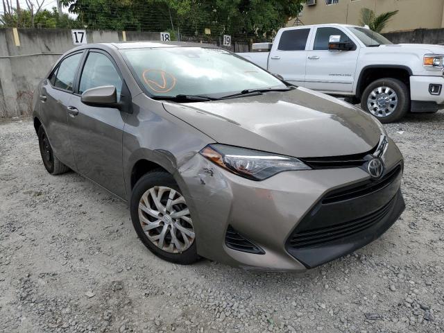TOYOTA COROLLA L 2017 with VIN 5YFBURHE8HP667563 - Photo from auction