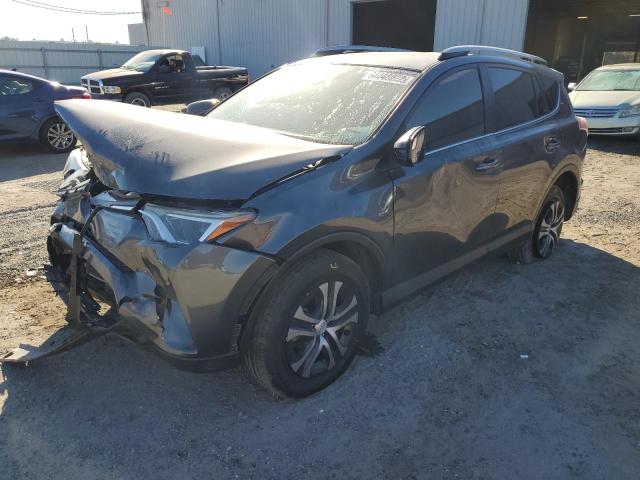 Photo 2 from auction – 2017 TOYOTA RAV4 LE with VIN JTMZFREV2HJ105479