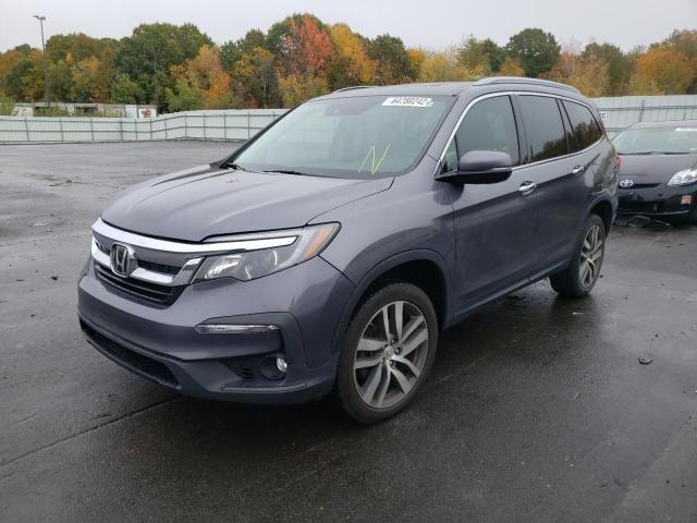 Photo 2 from auction – 2017 HONDA PILOT ELIT with VIN 5FNYF6H06HB002065