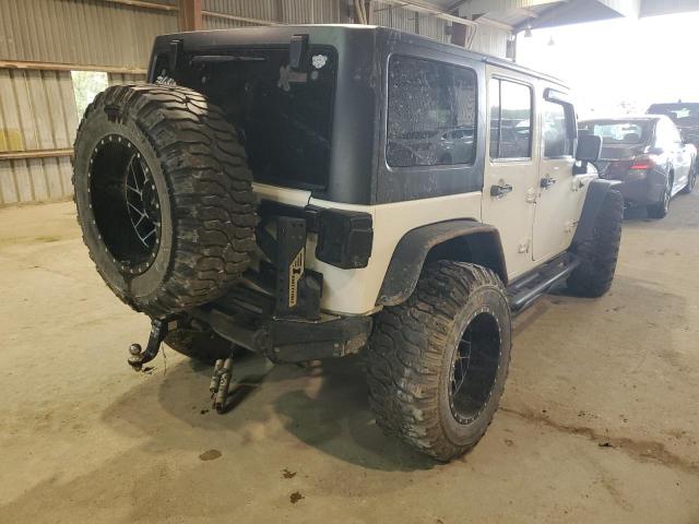 Photo 4 from auction – 2014 JEEP WRANGLER U with VIN 1C4BJWFG8EL115447