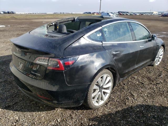Photo 4 from auction – 2018 TESLA MODEL 3 with VIN 5YJ3E1EB7JF107290
