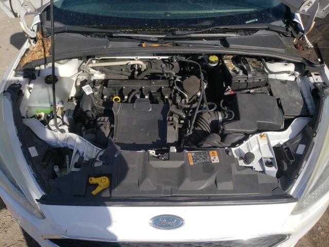 Photo 7 from auction – 2015 FORD FOCUS S with VIN 1FADP3E23FL311685