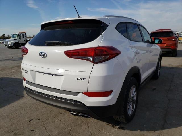 Photo 4 from auction – 2016 HYUNDAI TUCSON LIM with VIN KM8J33A21GU207010