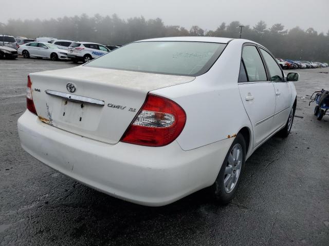 Photo 4 from auction – 2002 TOYOTA CAMRY LE with VIN JTDBE32K620063200